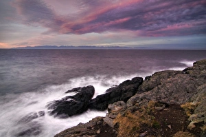 Images Dated 18th November 2012: USA, Washington, San Juan Islands. A dramatic sunrise over the Olympic Mountains