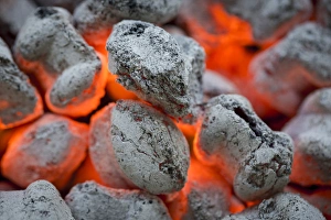 Burning Prints: USA, Washington, Seabeck. Close-up of hot charcoal