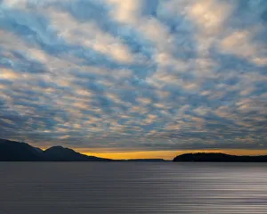 Blurred Prints: USA, Washington, Seabeck. Cloudy sunset on Hood Canal. Credit as