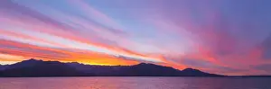 USA, Washington, Seabeck. Sunset panoramic over the Olympic Mountains and Hood Canal