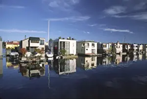 USA, Washington, Seattle. Modern houseboats line pier on Lake Union