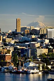 Images Dated 15th September 2009: USA, Washington, Seattle. Mt. Rainier looms large over downtown Seattle on Lake Union