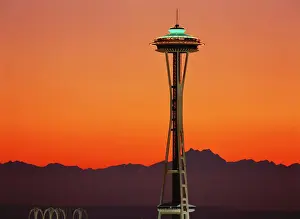 USA, Washington, Seattle, Space needle and Olympic Mountains at dusk