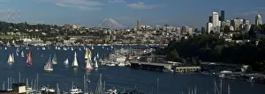 Images Dated 13th July 2010: USA, Washington, Seattle. Summer cityscape panorama features Lake Union, sailboats and Mt