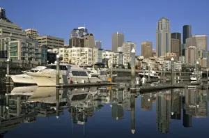 USA, Washington, Seattle. View of downtown skyscrapers from waterfront marina