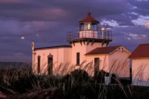 USA, Washington State, Hansville. Point No Point Lighthouse at sunset, the oldest