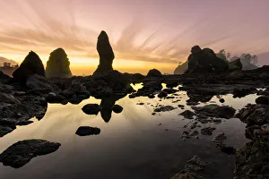 Images Dated 20th November 2018: USA, Washington State, Olympic National Park. Sunrise on coast beach and rocks. Credit as