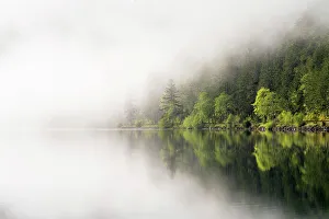USA, Washington State, Olympic National Park, Crescent Lake. Fog obscures some of Crescent Lake