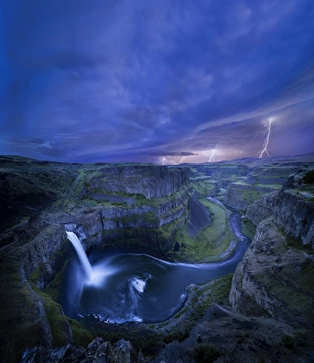 Danger Prints: USA. Washington State. Palouse Falls at dusk with an approaching lightning storm