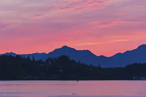 Salish Sea Prints: USA, Washington State, Puget Sound. Dramatic sunset over Olympic Mountains and Kitsap