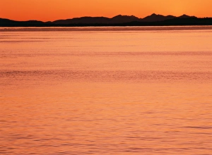 USA, Washington State, San Juan Island, County Park, View of sea in sunset at Vancouver USA, Washington State, San Juan Island, County Park, View of sea in sunset at Vancouver