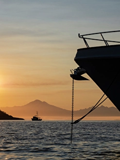 Images Dated 3rd September 2024: USA, Washington State, San Juan Islands, Sucia Island. Boats silhouetted in sunset
