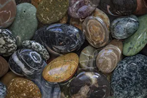 Pebble Prints: USA, Washington State, Seabeck. Close-up of wet beach stones