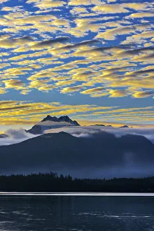 USA, Washington State, Seabeck. Sunset over Olympic Mountains and Hood Canal