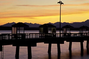 USA, Washington State, Seattle, Myrtle Edwards Park. Fishing Pier at sunset