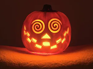 Halloween Prints: USA, Washington State. Smiling Jack O Lantern face on Pumpkin at Halloween