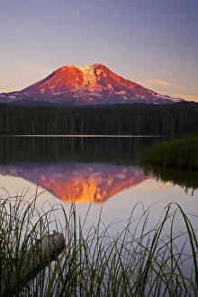 Images Dated 2021 July: USA, Washington State, Sunset on Mt. Adams reflecting in Lake Takhlakh