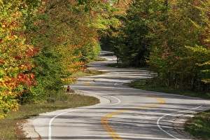 Wisconsin Prints: USA, Wisconsin. Curvy road in Door County in autumn
