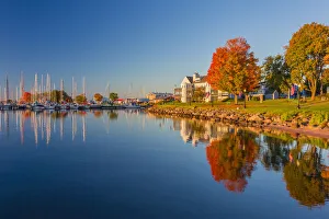 Wisconsin Prints: USA, Wisconsin. Fall colors reflected on the still waters of the harbor in Bayfield