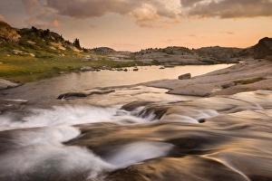 Images Dated 3rd August 2007: USA, Wyoming, Bridger National Forest, Bridger Wilderness, Wind River Range. Sunset on rapids