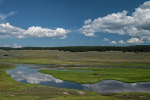 USA, Wyoming. Clouds reflected in Yellowstone River, Hayden Valley, Yellowstone National Park