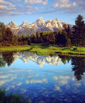 USA; Wyoming, Grand Teton National Park. A Grand Tetons reflecting in the Snake River