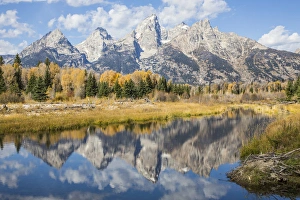 Images Dated 29th September 2015: USA, Wyoming, Grand Teton National Park, the Grand Teton Mountains are reflected