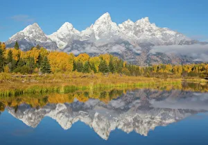 USA, Wyoming, Grand Teton National Park. Fresh snowfall covers the Grand Teton Mountains USA, Wyoming, Grand Teton National Park. Fresh snowfall covers the Grand Teton Mountains