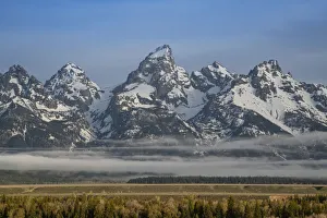 Images Dated 11th July 2018: USA, Wyoming, Grand Teton National Park. Morning fog and mountains