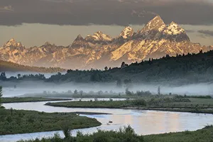 Images Dated 26th August 2020: USA, Wyoming, Grand Teton National Park. Sunrise on Teton Range and Buffalo River