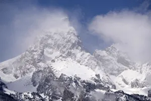 Images Dated 12th November 2021: USA, Wyoming, Grand Teton National Park. Clouds over mountains during spring snowstorm