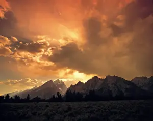 Tetons Prints: USA, Wyoming, Grand Teton NP. The Tetons are overshadowed by this beautiful sunset
