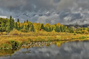 Snake River Prints: USA, Wyoming. Grand Tetons National Park view of Teton Mountains as they peak through the morning clouds