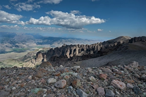 Lichen Prints: USA, Wyoming. Lichen colored rocks and pinnacle like cliffs in Absaroka Mountains