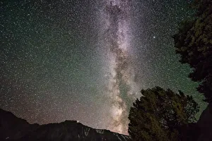 New Images March 2024 Prints: USA, Wyoming. Milky Way photograph of Absaroka Mountains near Cody