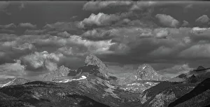 USA, Wyoming. Mount Owen, Grand and Middle Teton from the west with dramatic clouds