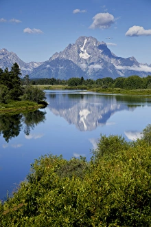 Images Dated 15th July 2015: USA, Wyoming. Mt. Moran reflected in the Snake River, Grand Teton National Park Credit as