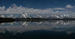 New Images March 2024 Prints: USA, Wyoming. Panoramic landscape of Teton Mountains reflected in Jackson Lake in springtime
