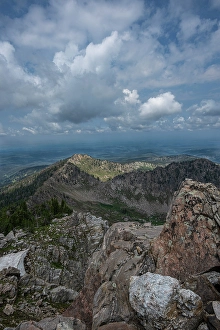 Hanging Prints: USA, Wyoming. Rugged landscape of Rammell Mountain and view of distant valley