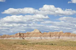 Striated Prints: USA, Wyoming, Sublette County, Cloudy sky over sagebrush and badlands
