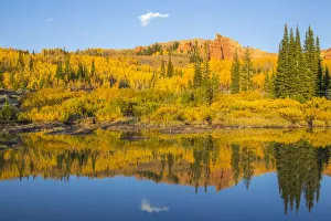 Aspen Prints: USA, Wyoming, Sublette County. The Red Cliffs in the Wyoming Range mountains is reflected