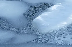Images Dated 27th June 2018: USA, Wyoming, Yellowstone National Park. Spring ice forms on lake