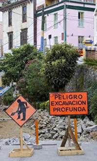 Images Dated 16th March 2010: ValparaIso, Chile. South America. Signs and construction to rebuild cobblestone street