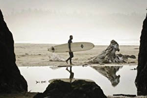 Images Dated 5th September 2011: Vancouver Island, Pacific Rim National Park. Surfer on the beach