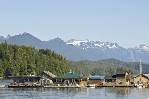 Images Dated 7th September 2011: Vancouver Island, Tofino. Floating houses in front of mountains of Strathcona Provincial