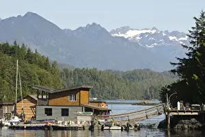 Images Dated 7th September 2011: Vancouver Island, Tofino. Floating houses in front of mountains of Strathcona Provincial