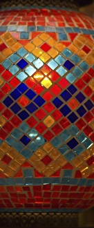 Images Dated 30th September 2005: Vendor in Spice Market offerring colorful Stained Glass Lamps, Spice Market Istanbul