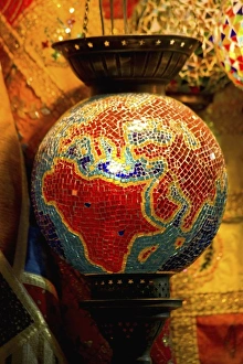 Images Dated 30th September 2005: Vendor in Spice Market offerring colorful Stained Glass Lamps, Spice Market Istanbul