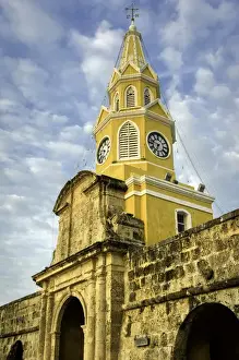Arched Prints: The venerable clock tower - Torre del Reloj - looks out over the Plaza de la Paz
