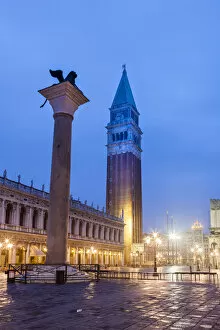 Venezian Lion Statue and the Campanile early Morning. Venice. Italy